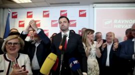 Davor Bernardić, SDP party leader, surrounded by supporters, celebrating good election results for social-democrats. HDZ vs. SDP rundown.