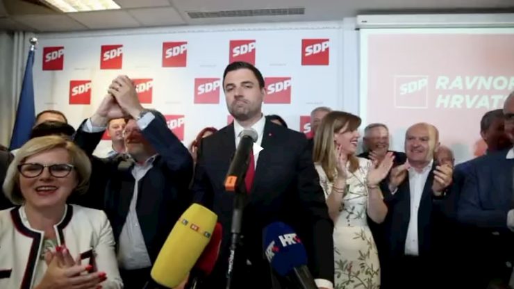 Davor Bernardić, SDP party leader, surrounded by supporters, celebrating good election results for social-democrats. HDZ vs. SDP rundown.