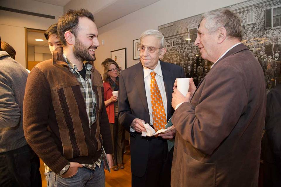 At 86, Nash (center) continued to inspire and work with younger researchers such as Michail Rassias (left), a Princeton visiting postdoctoral research associate in mathematics who was working on an upcoming book with Nash. Although 60 years Nash’s junior, Rassias admired Nash’s quick thinking and curiosity. This photo, taken during a special departmental reception in honor of Nash’s winning the Abel Prize, includes Yakov Sinai (right), a Princeton professor of mathematics, who was awarded the 2014 Abel Prize. (Photo by Danielle Alio, Office of Communications)